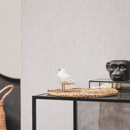 Weißer Vogel mit goldenen Details