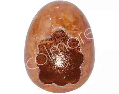 Decoratief ei SOLEIL van Colmore in sunrise orange met koperkleurig detail en opening voor theelichtje