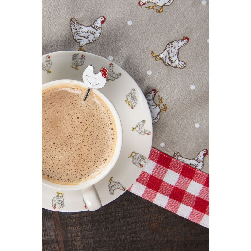 Tasse und Untertasse mit Hühnerdruck