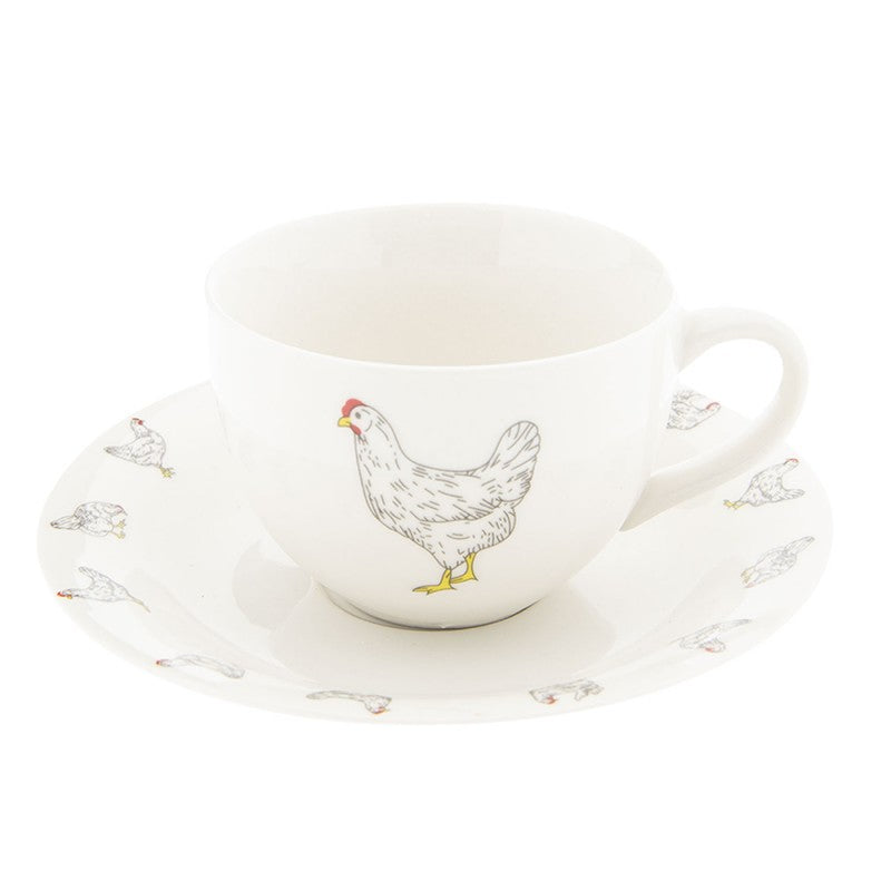 Tasse und Untertasse mit Hühnerdruck