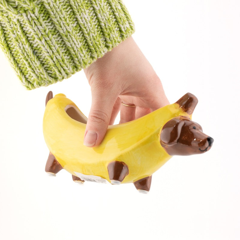 Keramisch opbergbakje in de vorm van een banaan met hondendetails, speels decoratief schaaltje