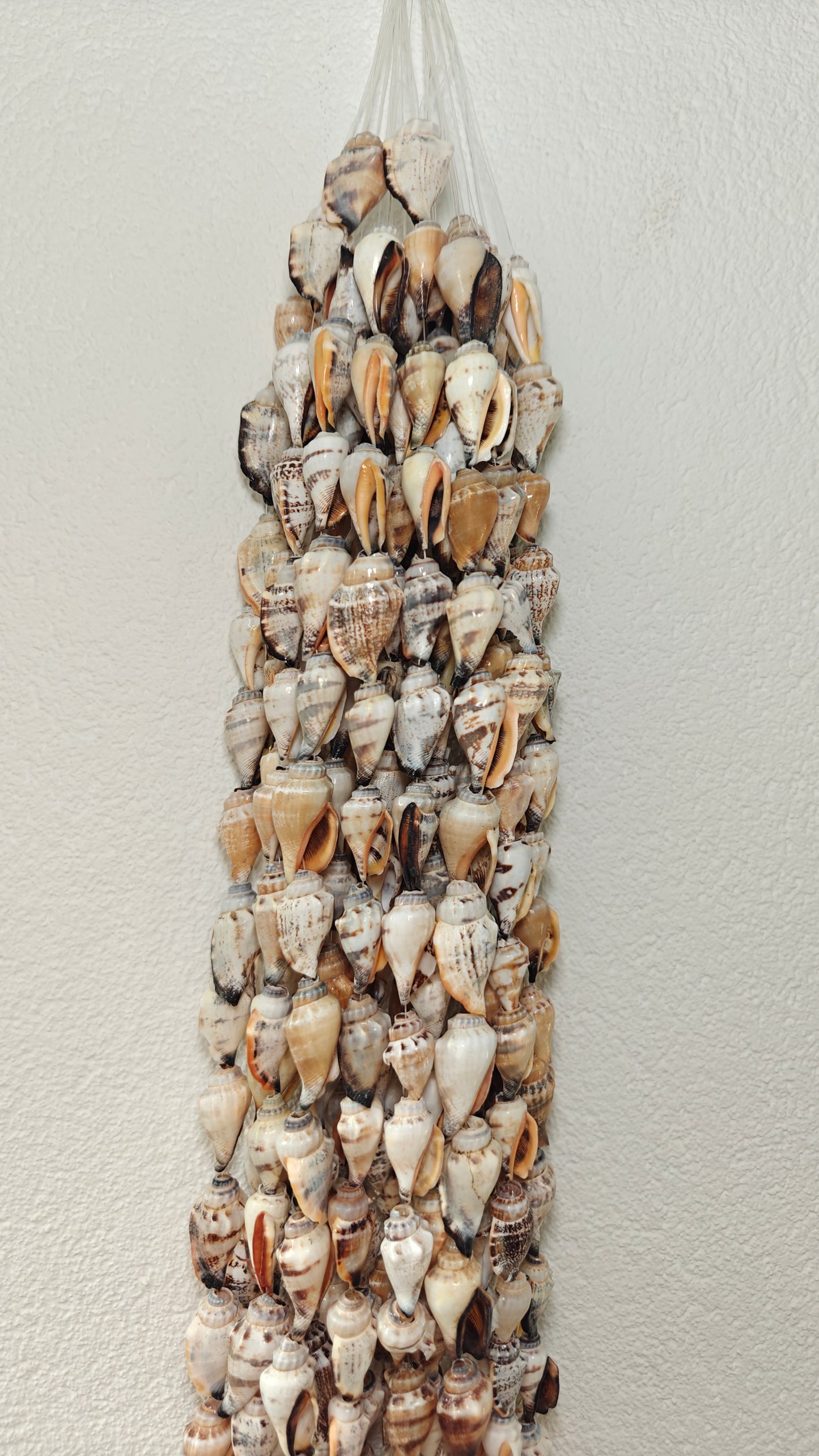 Gordon Percing – lange schelpenhanger uit Indonesië – 120 cm